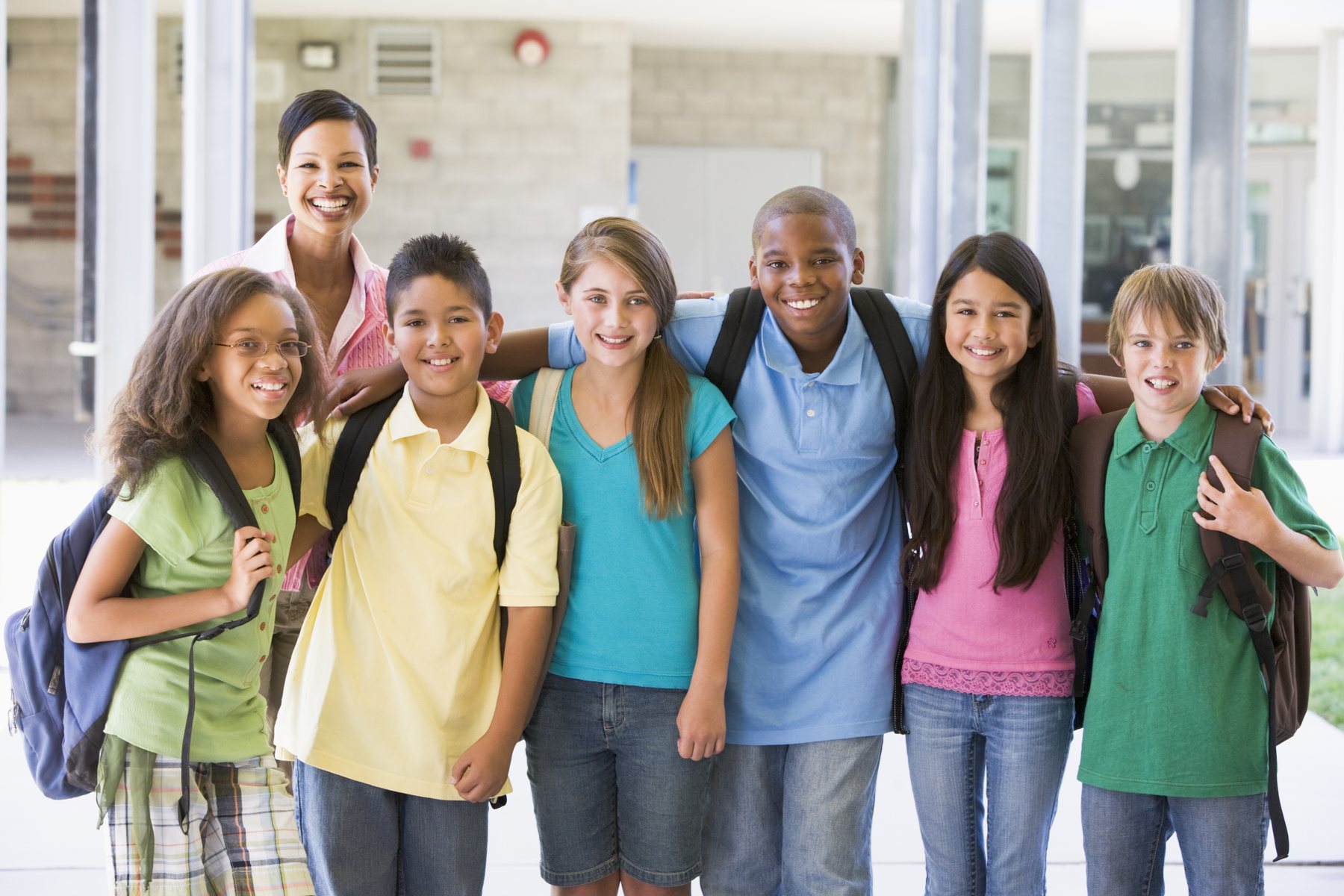 A diverse group of school-age children together